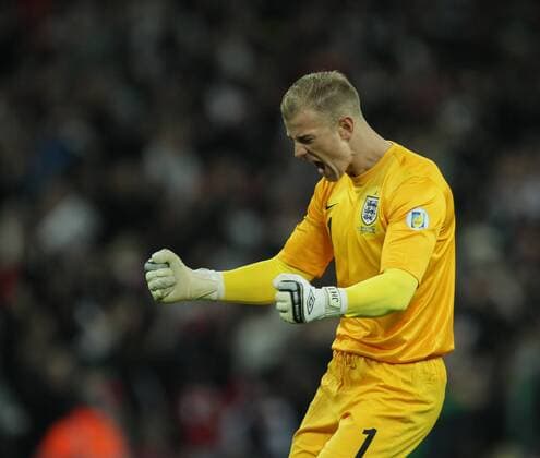 England v Montenegro - World Cup Qualifier . . Wembley, London, UK . . 11.10.2013 Joe Hart (E) celebrates the third England goal.