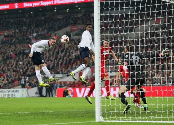 England s Wayne Rooney scoring his sides opening goal England v Poland - 2014 World Cup Qualifier - Wembley - London - England -15 10 2013 - Pic David Klein Sportimage EDITORIAL USE ONLY. No use with unauthorised audio, video, data, fixture lists, club league logos or live services. Online in-match use limited to 120 images, no video emulation. No use in betting, games or single club league player publications.