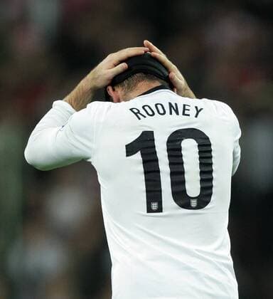 England v Poland - World Cup Qualifier . . Wembley, London, UK . . 15.10.2013 Wayne Rooney (E) holds his headband.
