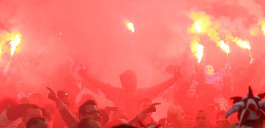 Poland - World Cup Qualifier . . Wembley, London . . 15.10.2013 Red flares light up the Poland fans.