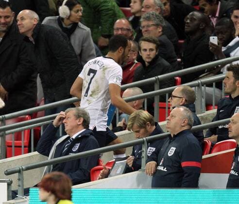 England v Poland - World Cup Qualifier . . Wembley, London, UK . . 15.10.2013 Andros Townsend (E) walks past Roy Hodgson (England manager) after being substituted in the second half.
