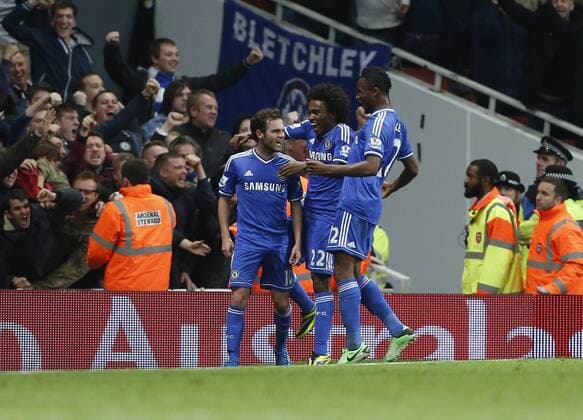 Chelsea s Juan Mata celebrates scoring his sides second goal Arsenal v Chelsea - Capital One Cup Fourth Round - The Emirates - London - England -29 10 2013 - Pic David Klein Sportimage EDITORIAL USE ONLY. No use with unauthorised audio, video, data, fixture lists, club league logos or live services. Online in-match use limited to 120 images, no video emulation. No use in betting, games or single club league player publications.