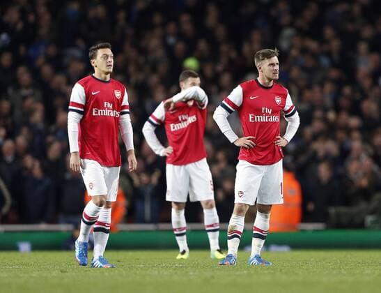 Arsenal s Mesut Ozil and Aaron Ramsey look on dejected after going 2-0 down Arsenal v Chelsea - Capital One Cup Fourth Round - The Emirates - London - England -29 10 2013 - Pic David Klein Sportimage EDITORIAL USE ONLY. No use with unauthorised audio, video, data, fixture lists, club league logos or live services. Online in-match use limited to 120 images, no video emulation. No use in betting, games or single club league player publications.