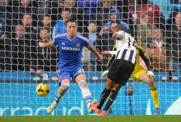 Loic Remy of Newcastle United scores the second goal past John Terry of Chelsea - Barclays Premier League - Newcastle Utd vs Chelsea - St James Park Stadium - Newcastle - England - 02 11 13 - Picture Simon Bellis Sportimage EDITORIAL USE ONLY. No use with unauthorised audio, video, data, fixture lists, club league logos or live services. Online in-match use limited to 120 images, no video emulation. No use in betting, games or single club league player publications.