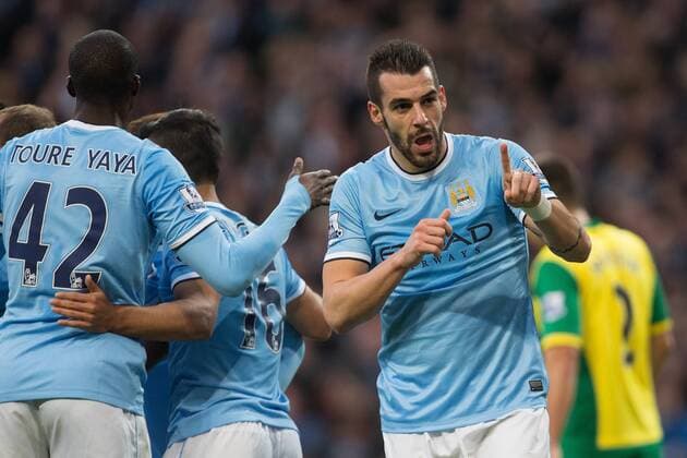 Alvaro Negredo of Manchester City celebrates scoring his sides fourth goal - Manchester City vs. Norwich City - Barclay s Premier League - Etihad Stadium - Manchester - 02 11 2013 Pic Philip Oldham Sportimage EDITORIAL USE ONLY. No use with unauthorised audio, video, data, fixture lists, club league logos or live services. Online in-match use limited to 120 images, no video emulation. No use in betting, games or single club league player publications.