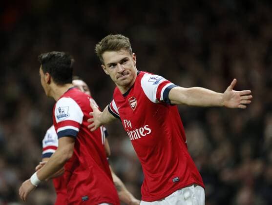 Arsenal s Aaron Ramsey celebrates scoring his sides second goal Arsenal v Liverpool - Barclays Premier League - Emirates Stadium - London - England -02 11 2013 - Pic David Klein Sportimage EDITORIAL USE ONLY. No use with unauthorised audio, video, data, fixture lists, club league logos or live services. Online in-match use limited to 120 images, no video emulation. No use in betting, games or single club league player publications.
