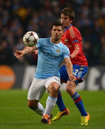 Sergio - Kun - Aguero of Manchester City tussles with Georgi Schennikov of CSKA Moscow - UEFA Champions League Group D - Manchester City vs CSKA Moscow - Etihad Stadium - Manchester - England - 05 11 13 - EDITORIAL USE ONLY. No use with unauthorised audio, video, data, fixture lists, club league logos or live services. Online in-match use limited to 120 images, no video emulation. No use in betting, games or single club league player publications.
