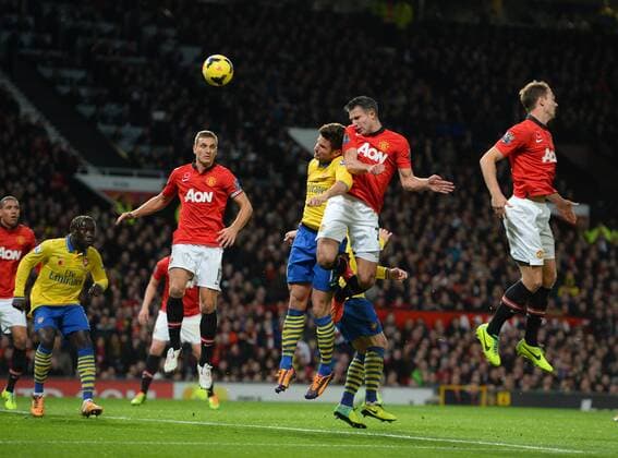Robin van Persie of Manchester United scores the first goal - Barclays Premier League - Manchester United (ManU) vs Arsenal FC London - Old Trafford Stadium - Manchester - England - 10 11 13 - EDITORIAL USE ONLY. No use with unauthorised audio, video, data, fixture lists, club league logos or live services. Online in-match use limited to 120 images, no video emulation. No use in betting, games or single club league player publications.