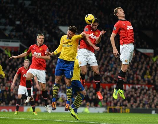 Robin van Persie of Manchester United scores the first goal - Barclays Premier League - Manchester United (ManU) vs Arsenal FC London - Old Trafford Stadium - Manchester - England - 10 11 13 - EDITORIAL USE ONLY. No use with unauthorised audio, video, data, fixture lists, club league logos or live services. Online in-match use limited to 120 images, no video emulation. No use in betting, games or single club league player publications.
