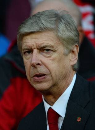 Arsene Wenger manager of Arsenal - Barclays Premier League - Manchester United (ManU) vs Arsenal FC London - Old Trafford Stadium - Manchester - England - 10 11 13 - EDITORIAL USE ONLY. No use with unauthorised audio, video, data, fixture lists, club league logos or live services. Online in-match use limited to 120 images, no video emulation. No use in betting, games or single club league player publications.