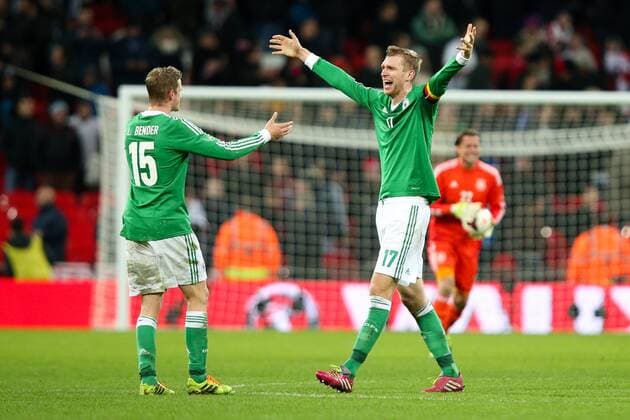 Germany s goalscorer and captain Per Mertesacker celebrates the victory with Germany s Lars Bender - England v Germany - International Friendly - Wembley Stadium - London - 19th November 2013 - Pic Charlie Forgham-Bailey Sportimage EDITORIAL USE ONLY. No use with unauthorised audio, video, data, fixture lists, club league logos or live services. Online in-match use limited to 120 images, no video emulation. No use in betting, games or single club league player publications.