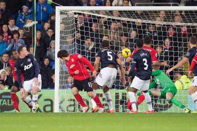 Cardiff s Kim Bo-Kyung scores a late equaliser - Cardiff City vs. Manchester United - Barclays Premier League - Cardiff City Stadium - Cardiff - 24 11 2013 Pic Philip Oldham Sportimage EDITORIAL USE ONLY. No use with unauthorised audio, video, data, fixture lists, club league logos or live services. Online in-match use limited to 120 images, no video emulation. No use in betting, games or single club league player publications.