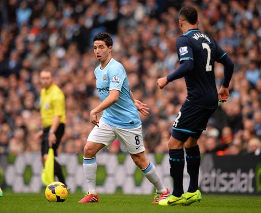 Samir Nasri of Manchester City - Barclays Premier League - Manchester City vs Tottenham Hotspur - Etihad Stadium - Manchester - England - 24th November 2013 - EDITORIAL USE ONLY. No use with unauthorised audio, video, data, fixture lists, club league logos or live services. Online in-match use limited to 120 images, no video emulation. No use in betting, games or single club league player publications.