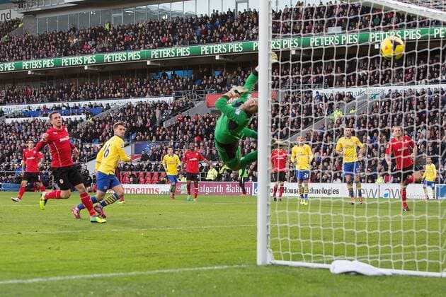Arsenal s Aaron Ramsey scores the opening goal - Cardiff City vs. Arsenal FC London - Barclays Premier League - Cardiff City Stadium - Cardiff - 30 11 2013 EDITORIAL USE ONLY. No use with unauthorised audio, video, data, fixture lists, club league logos or live services. Online in-match use limited to 120 images, no video emulation. No use in betting, games or single club league player publications.