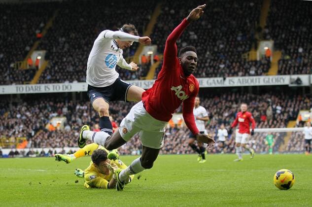 Tottenham s Hugo Lloris bring down Manchester United s Danny Welbeck for a penalty Tottenham Hotspur v Manchester United - Premier League - White Hart Lane - London - 01 12 2013 - Pic David Klein Sportimage EDITORIAL USE ONLY. No use with unauthorised audio, video, data, fixture lists, club league logos or live services. Online in-match use limited to 120 images, no video emulation. No use in betting, games or single club league player publications.