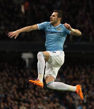 Alvaro Negredo of Manchester City celebrates his opening goal - Manchester City vs. Swansea City - Barclays Premier League - Etihad Stadium - Manchester - 01 12 2013 Pic Philip Oldham Sportimage EDITORIAL USE ONLY. No use with unauthorised audio, video, data, fixture lists, club league logos or live services. Online in-match use limited to 120 images, no video emulation. No use in betting, games or single club league player publications.
