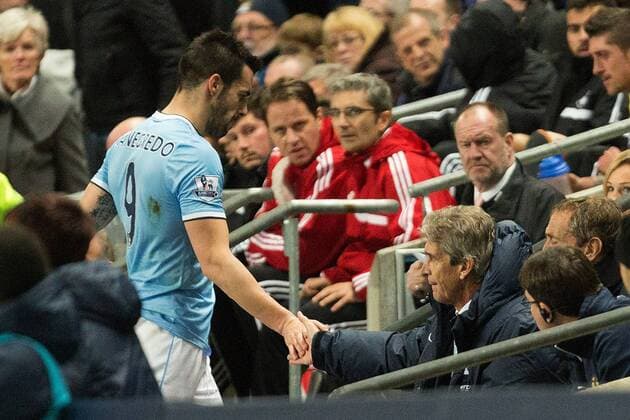 Manuel Pellegrini, manager of Manchester City thanks Alvaro Negredo following his substitution - Manchester City vs. Swansea City - Barclays Premier League - Etihad Stadium - Manchester - 01 12 2013 Pic Philip Oldham Sportimage EDITORIAL USE ONLY. No use with unauthorised audio, video, data, fixture lists, club league logos or live services. Online in-match use limited to 120 images, no video emulation. No use in betting, games or single club league player publications.