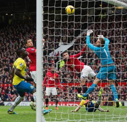Robin van Persie of Manchester United heads the ball into the goal but has it ruled offside - Manchester United vs. Newcastle United - Barclays Premier League - Old Trafford - Manchester - 04 12 2013 Pic Philip Oldham Sportimage EDITORIAL USE ONLY. No use with unauthorised audio, video, data, fixture lists, club league logos or live services. Online in-match use limited to 120 images, no video emulation. No use in betting, games or single club league player publications.