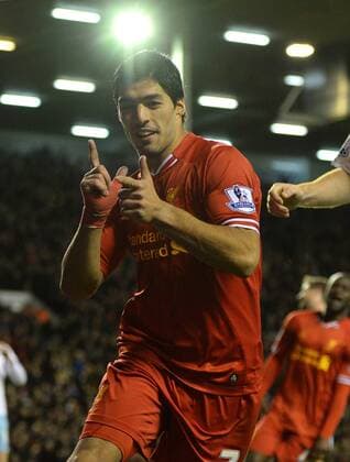 Luis Suarez of Liverpool celebrates the third goal - Barclays Premier League - Liverpool vs West Ham Utd - Anfield Stadium - Liverpool - England - 7th December 2013 - Picture Simon Bellis Sportimage EDITORIAL USE ONLY. No use with unauthorised audio, video, data, fixture lists, club league logos or live services. Online in-match use limited to 120 images, no video emulation. No use in betting, games or single club league player publications.