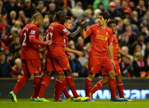 Luis Suarez of Liverpool celebrates the first goal - Barclays Premier League - Liverpool vs West Ham Utd - Anfield Stadium - Liverpool - England - 7th December 2013 - Picture Simon Bellis Sportimage EDITORIAL USE ONLY. No use with unauthorised audio, video, data, fixture lists, club league logos or live services. Online in-match use limited to 120 images, no video emulation. No use in betting, games or single club league player publications.