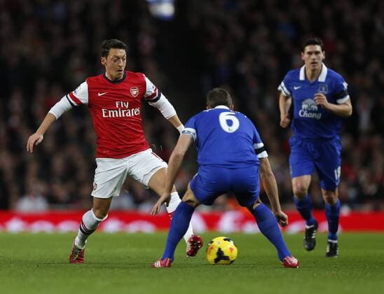 Arsenal s Mesut Ozil in action Arsenal v Everton - Premier League - Emirates Stadium - London - 08 12 2013 - Pic David Klein Sportimage EDITORIAL USE ONLY. No use with unauthorised audio, video, data, fixture lists, club league logos or live services. Online in-match use limited to 120 images, no video emulation. No use in betting, games or single club league player publications.