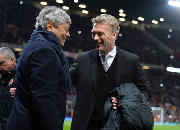 David Moyes manager of Manchester United greets Mircea Lucescu manager of Shakhtar Donetsk - UEFA Champions League Group A - Manchester Utd vs Shakhtar Donetsk - Old Trafford Stadium - Manchester - England - 10 12 13 - Picture Simon Bellis Sportimage EDITORIAL USE ONLY. No use with unauthorised audio, video, data, fixture lists, club league logos or live services. Online in-match use limited to 120 images, no video emulation. No use in betting, games or single club league player publications.