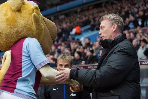 David Moyes, manager of Manchester United shakes hands with the Aston Villa lion mascot - Aston Villa vs. Manchester United - Barclays Premier League - Villa Park - Birmingham - 15 12 2013 EDITORIAL USE ONLY. No use with unauthorised audio, video, data, fixture lists, club league logos or live services. Online in-match use limited to 120 images, no video emulation. No use in betting, games or single club league player publications.