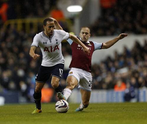Tottenham s Andros Townsend tussles with West Ham s Joe Cole Tottenham Hotspur vs West Ham United - League Cup - White Hart Lane - London - England - 18 12 2013 - Pic David Klein Sportimage EDITORIAL USE ONLY. No use with unauthorised audio, video, data, fixture lists, club league logos or live services. Online in-match use limited to 120 images, no video emulation. No use in betting, games or single club league player publications.