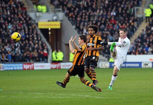 Manchester United s Wayne Roney scoring his sides second goal Hull City vs Manchester United - Premier League - KC Stadium - London - England - 26 12 2013 - Pic David Klein Sportimage EDITORIAL USE ONLY. No use with unauthorised audio, video, data, fixture lists, club league logos or live services. Online in-match use limited to 120 images, no video emulation. No use in betting, games or single club league player publications.