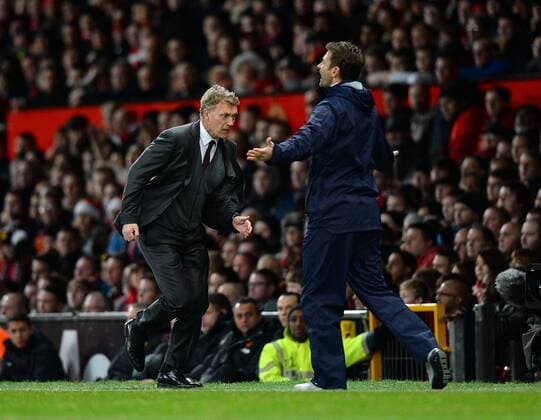 David Moyes manager of Manchester United chases after the ball in desperation - Barclays Premier League - Manchester Utd vs Tottenham - Old Trafford Stadium - Manchester - England - 1st January 2014 - Picture Simon Bellis Sportimage EDITORIAL USE ONLY. No use with unauthorised audio, video, data, fixture lists, club league logos or live services. Online in-match use limited to 120 images, no video emulation. No use in betting, games or single club league player publications.