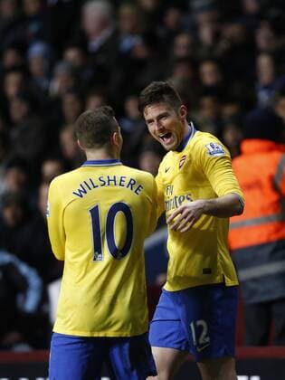Arsenal s Olivier Giroud celebrates scoring his sides second goal Aston Villa - Arsenal FC London. Premier League - Villa Park- Birmingham - England - 13 01 2014 - PicxDavidxKleinxSportimagex EDITORIAL USE ONLY. No use with unauthorised audio, video, data, fixture lists, club league logos or live services. Online in-match use limited to 120 images, no video emulation. No use in betting, games or single club league player publications.