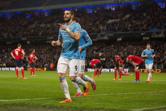 Alvaro Negredo of Manchester City celebrates his opening goal - Manchester City vs. Blackburn Rovers - FA Cup Third Round Replay - Etihad Stadium - Manchester - 15 01 2014 Pic Philip Oldham Sportimage EDITORIAL USE ONLY. No use with unauthorised audio, video, data, fixture lists, club league logos or live services. Online in-match use limited to 120 images, no video emulation. No use in betting, games or single club league player publications.