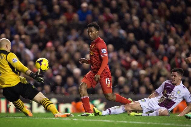 Daniel Sturridge of Liverpool scores his sides first goal - Liverpool FC vs. Aston Villa - Barclays Premier League - Anfield - Liverpool - 18 01 2014 Pic PhilipxOldham Sportimage EDITORIAL USE ONLY. No use with unauthorised audio, video, data, fixture lists, club league logos or live services. Online in-match use limited to 120 images, no video emulation. No use in betting, games or single club league player publications.