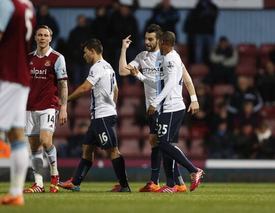 Manchester City s Alvaro Negredo celebrates scoring his sides opening goal West Ham United vs Manchester City - League Cup Semi Final, Second Leg - Upton Park - London - England - 21 01 2014 - Pic David Klein Sportimage EDITORIAL USE ONLY. No use with unauthorised audio, video, data, fixture lists, club league logos or live services. Online in-match use limited to 120 images, no video emulation. No use in betting, games or single club league player publications.