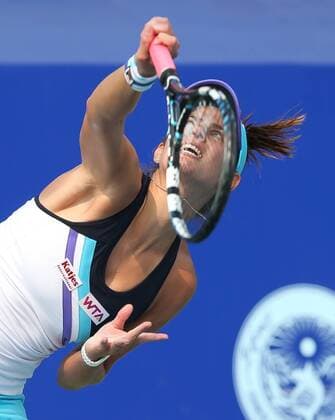 PTT Pattaya Open 2014,WTA Tennis Turnier, International Series, Dusit Resort in Pattaya, Thailand, Julia Goerges (GER), Aktion,Aufschlag,Einzelbild,Halbkoerper, Hochformat,kurios,
