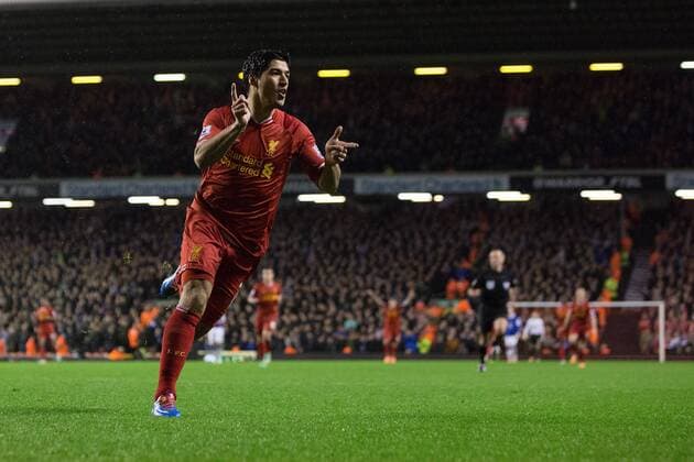 Luis Suarez of Liverpool celebrates scoring his sides fourth goal - Liverpool FC vs. Everton FC - Barclays Premier League - Anfield - Liverpool - 28 01 2014 EDITORIAL USE ONLY. No use with unauthorised audio, video, data, fixture lists, club league logos or live services. Online in-match use limited to 120 images, no video emulation. No use in betting, games or single club league player publications.