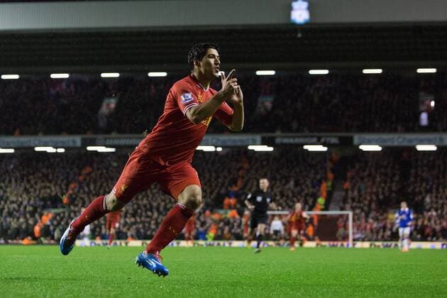Luis Suarez of Liverpool celebrates scoring his sides fourth goal - Liverpool FC vs. Everton FC - Barclays Premier League - Anfield - Liverpool - 28 01 2014 EDITORIAL USE ONLY. No use with unauthorised audio, video, data, fixture lists, club league logos or live services. Online in-match use limited to 120 images, no video emulation. No use in betting, games or single club league player publications.