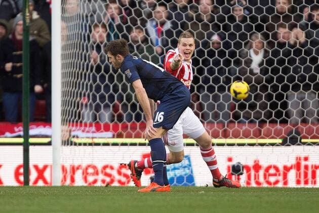 Michael Carrick of Manchester United (ManU) looks dejected as Stoke s Ryan Shawcross celebrates his sides opening goal - Stoke City vs. Manchester United (ManU) - Premier League - Britannia Stadium - Stoke - 01 02 2014 Pic PhilipxOldham Sportimage EDITORIAL USE ONLY. No use with unauthorised audio, video, data, fixture lists, club league logos or live services. Online in-match use limited to 120 images, no video emulation. No use in betting, games or single club league player publications.