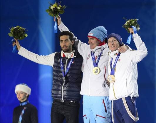 Medalists in the men s biathlon 15K mass start, right to left, Czech Republic s Ondrej Moravec, bronze, Norway s Emil Hegle Svendsen, gold, and France s Martin Fourcade, silver, pose with their medals at the 2014 Winter Olympics in Sochi, Russia, Tuesday, February 18, 2014. (CTKxPhoto RomanxVondrous) CTKPhotoP201402180945701