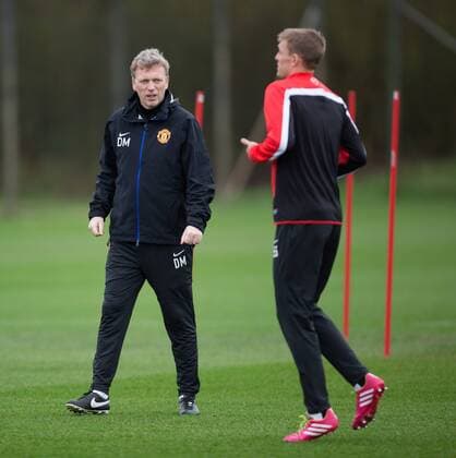 David Moyes, manager of Manchester United talks to Darren Fletcher about the Euro 2016 draw and Scotland s chances - Manchester United Training - UEFA Champions League - Aon Training Complex - Carrington, Manchester - England - 24th February 2014 - Picture Philip Oldham Sportimage EDITORIAL USE ONLY. No use with unauthorised audio, video, data, fixture lists, club league logos or live services. Online in-match use limited to 120 images, no video emulation. No use in betting, games or single club league player publications.