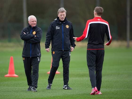 David Moyes, manager of Manchester United talks to Darren Fletcher about the Euro 2016 draw and Scotland s chances - Manchester United Training - UEFA Champions League - Aon Training Complex - Carrington, Manchester - England - 24th February 2014 - Picture Philip Oldham Sportimage EDITORIAL USE ONLY. No use with unauthorised audio, video, data, fixture lists, club league logos or live services. Online in-match use limited to 120 images, no video emulation. No use in betting, games or single club league player publications.