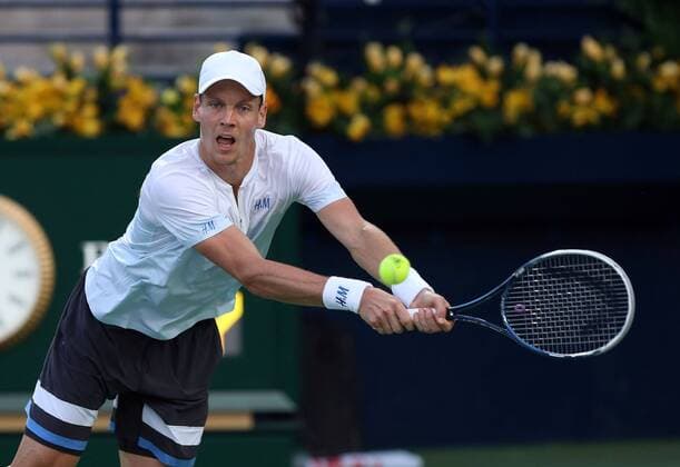 Dubai Tennis Championships 2014, ATP Tennis Herren Tennis Turnier,International Series,Dubai Tennis Stadium, U.A.E., Tomas Berdych (CZE),Aktion,Einzelbild, Halbkörper,Querformat,
