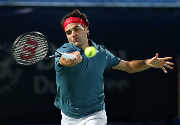 Dubai Tennis Championships 2014, ATP Tennis Herren Tennis Turnier,International Series,Dubai Tennis Stadium, U.A.E.,Final,Endspiel,Roger Federer (SUI),Aktion, Einzelbild,Halbkörper,Querformat,