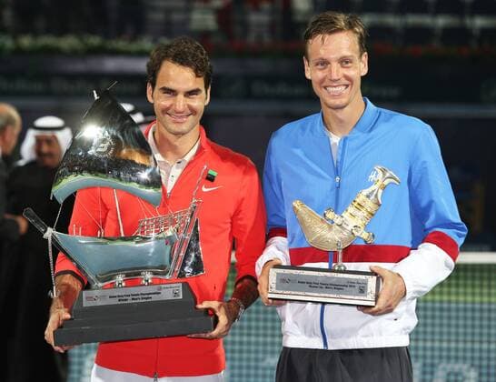 Dubai Tennis Championships 2014, ATP Tennis Herren Tennis Turnier,International Series,Dubai Tennis Stadium, U.A.E.,Final,Endspiel,Siegerehrung,Praesentation, L-R. Sieger Roger Federer (SUI) und Finalist Tomas Berdych (CZE) mit Pokal, Halbkörper,Querformat,