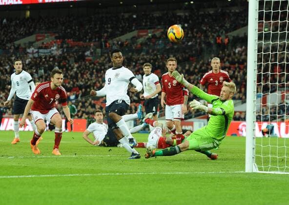 Football - 2014 International Friendly - England vs. Denmark England s Daniel Sturridge has his shot saved by Denmark s Kasper Schmeichel at Wembley. COLORSPORT ANDREW COWIE
