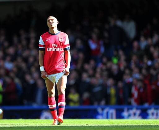 Arsenal s Kieran Gibbs looks on dejected Chelsea vs Arsenal - Premier League - Stamford Bridge - London - England - 22 03 2014 - Pic David Klein Sportimage EDITORIAL USE ONLY. No use with unauthorised audio, video, data, fixture lists, club league logos or live services. Online in-match use limited to 120 images, no video emulation. No use in betting, games or single club league player publications.
