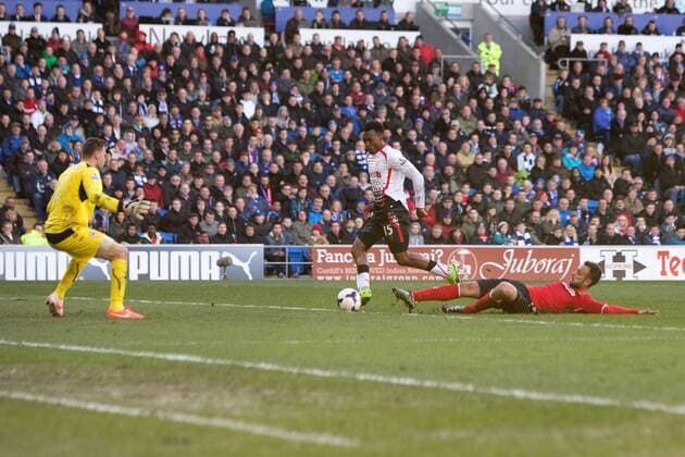 Daniel Sturridge of Liverpool scores his sides fifth goal - Barclays Premier League - Cardiff City vs. FC Liverpool - Cardiff City Stadium - Cardiff - Wales - 22nd March 2014 - EDITORIAL USE ONLY. No use with unauthorised audio, video, data, fixture lists, club league logos or live services. Online in-match use limited to 120 images, no video emulation. No use in betting, games or single club league player publications.