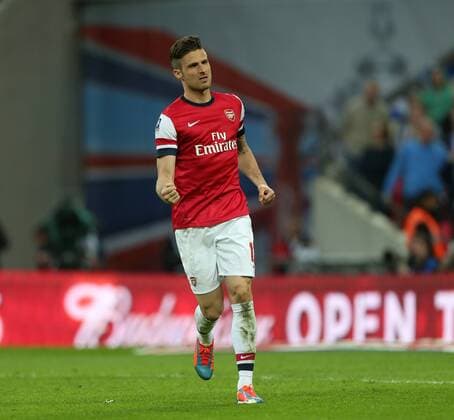 Arsenal s Olivier Giroud celebrates scoring his penalty Wigan Athletic vs Arsenal- FA Cup Semi Final, Wembley Stadium - London - England - 12 04 2014 - Pic David Klein Sportimage EDITORIAL USE ONLY. No use with unauthorised audio, video, data, fixture lists, club league logos or live services. Online in-match use limited to 120 images, no video emulation. No use in betting, games or single club league player publications.