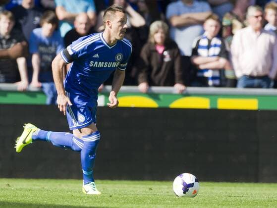 Football - 2013 2014 Premier League - Swansea City vs. Chelsea John Terry of Chelsea at the the Liberty Stadium. COLORSPORT WINSTON BYNORTH