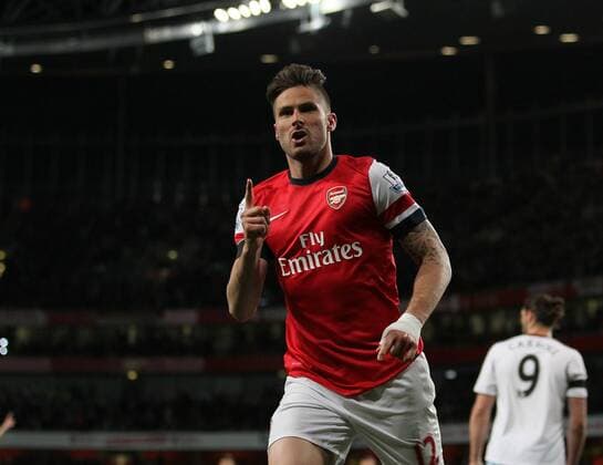 Arsenal s Olivier Giroud celebrates scoring his sides second goal Arsenal vs West Ham United- Barclays Premier League - Emirates Stadium - London - England - 15 04 2014 - Pic David Klein Sportimage EDITORIAL USE ONLY. No use with unauthorised audio, video, data, fixture lists, club league logos or live services. Online in-match use limited to 120 images, no video emulation. No use in betting, games or single club league player publications.